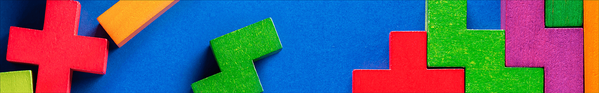 multi colored wood puzzle pieces multi colored wood puzzle pieces
