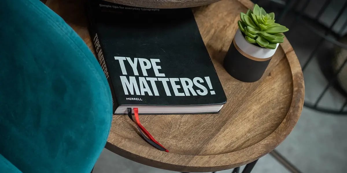 The book Type Matters on a coffee table